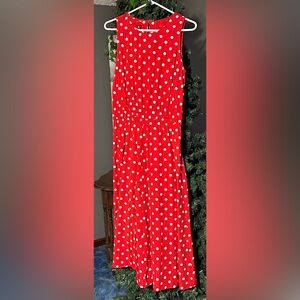 My Michelle dress red polka dot has elastic waist band hits about mid-shin